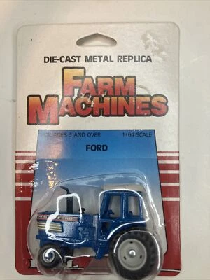 1986 FORD TW-35 TRACTOR 1/64 ERTL FARM MACHINES WITH FWDA NIP MADE KOREA - Image 1 of 4