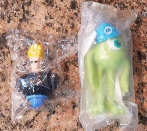 LOTTO DI 2 TOP KELLOGG'S CEREAL SPINNING JOHNNY BRAVO & MONSTER'S MIKE WAZOWSKI. - Foto 1 di 6