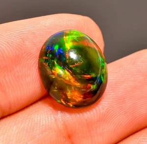 5 Ct Natural Black Ethiopian Oval Cabs Opal Fire Play Opal Gemstone 14X12X6 mm - Picture 1 of 4