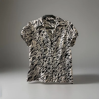 Top para mujer East 5th L negro/blanco hoja abotonada cuello manga corta abullonada Foto 1 de 4