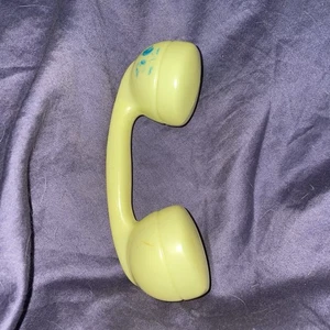Vintage Baby Spielzeug Rassel Kunststoff Telefon GELB - Bild 1 von 4