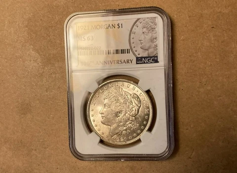 1921 Morgan $1 MS 63 NGC 100th Anniversary as Pictured Cover