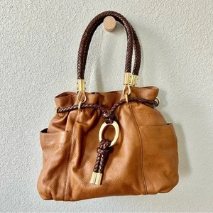 Borsa a tracolla Michael Kors Skorpios in pelle intrecciata marrone - Foto 1 di 10