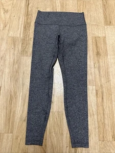 Lululemon Wunder Under tiro alto ajustado 28" tejido jaspeado negro para mujer talla 10 - Imagen 1 de 6