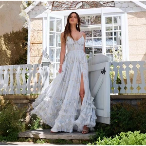 Vestido largo estampado dividido cintura ceñido volantes dobladillo sin mangas con honda - Imagen 1 de 25