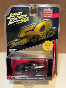 1/64 JOHNNY LIGHTNING 50 YEARS 1999 NISSAN SKYLINE GT-R BRN34 BLACK & GOLD MIJO - Picture 1 of 2