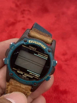 Reloj digital Timex Expedition Indiglo alarma cuero verde azulado y naranja necesita batería Foto 1 de 4