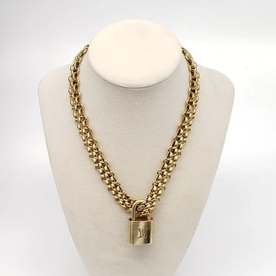 Auténtico candado dorado Louis Vuitton con cadena de acero inoxidable de moda sin marca Foto 1 de 4