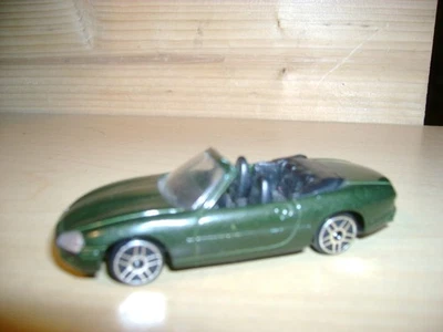Maisto Jaguar XK8 convertible escala 1:64 diecast verde metálico Foto 1 de 4