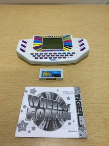 Tiger Electronics Glücksrad Handheld-Spiel mit Cartridge 1995 - getestet - Bild 1 von 2