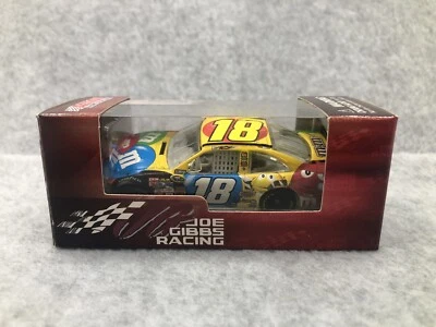 2010 KYLE BUSCH M&M’S TOYOTA CAMRY COT 1/64 NASCAR DIECAST - Image 1 of 4