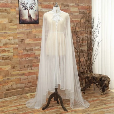 Capa de boda marfil capa de tul con apliques de encaje y botones Foto 1 de 4