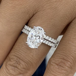 Juego de anillos nupciales de oro blanco de 14 quilates diamantes ovalados creados en laboratorio de 3,3 quilates E/VVS2 - Imagen 1 de 9