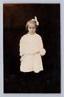 Little Girl w Piercing Eyes RPPC Interesting Antique Photo Fostoria Ohio 1910s