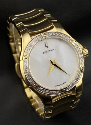 Accutron Bulova Gold Tone Pearlescent Dial Diamond Bezel Swiss Watch Elegant  - Image 1 of 4