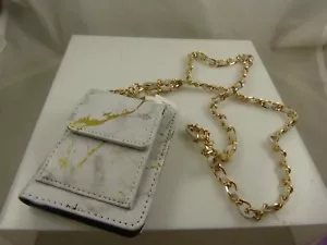 Porta ID cordino portachiavi oro bianco Claire's cinturino lungo portafoglio - Foto 1 di 6