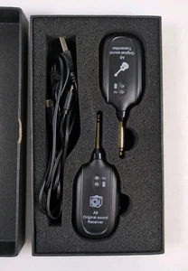 Sistema inalámbrico para guitarra A8-1. Cable de carga transmisor, receptor y USB - Imagen 1 de 2