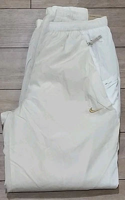 Calça de futebol Nike Therma-FIT Culture of Football creme FN2391-104 US$ 110 masculina pequena - Imagem 1 de 4