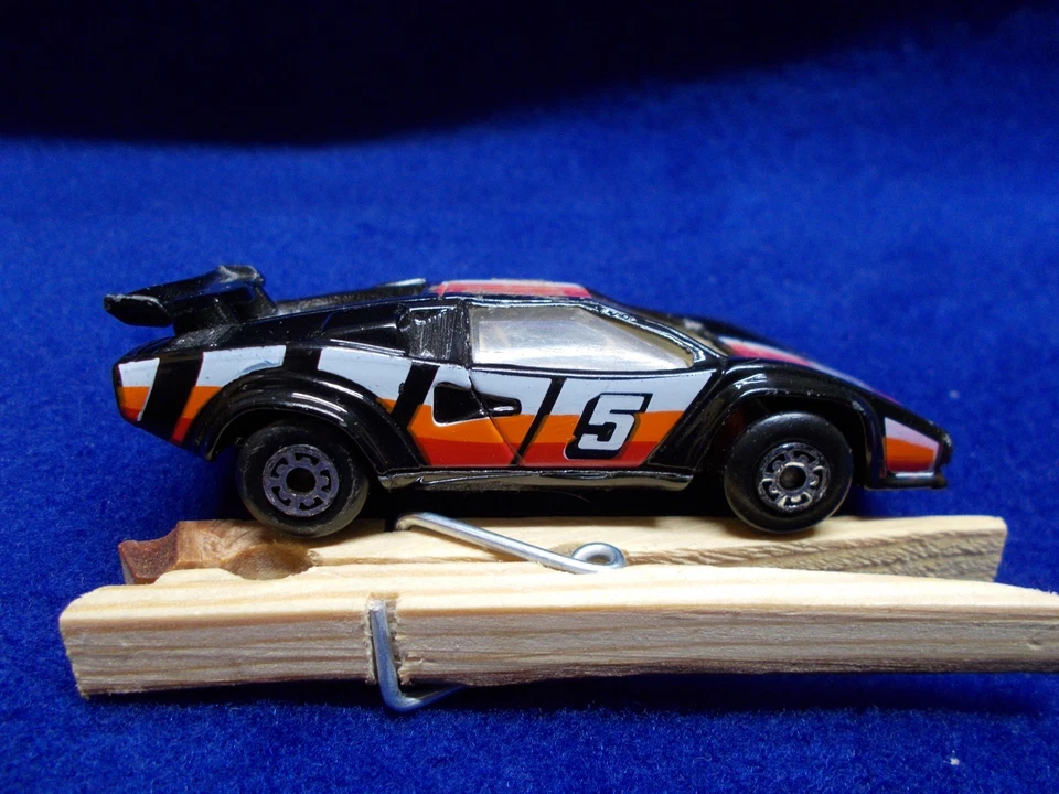 MATCHBOX SUPERFAST BLACK LAMBORGHINI COUNTACH *LP500 w/ WHITE & ORANGE STRIPES - Image 1 of 3