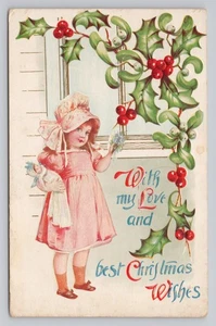 Best Christmas Wishes Girl in Bonnet with Baby Doll Holly & Berries Postal - Imagen 1 de 2
