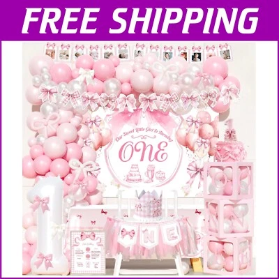 Elegantes decoraciones de 1er cumpleaños para niñas: tema de lazo rosa con corona y más Foto 1 de 4