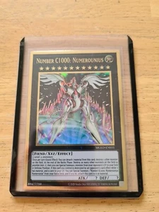YuGiOh Zahl C1000: Numeroun MGED-DE031 Premium Gold Rare - Bild 1 von 4