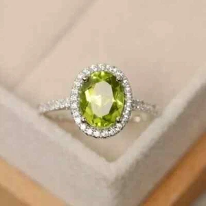 Lab Created Peridot 2Ct Oval Cut Halo Engagement Ring In 14K White Gold Plated - Picture 1 of 7