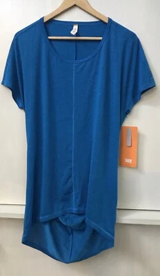 Top Lucy Mujer Azul Uncharted Manga Corta Fluido Malla Alto Bajo Talla M Nuevo con Etiquetas Foto 1 de 4