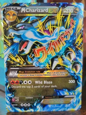 M Charizard EX (X) 69/106 Flashfire Holo - Image 1 of 2