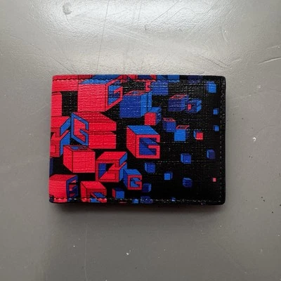 Cartera para hombre Gucci doble pliegue cuadrada G con estampado espacial - naranja/azul Foto 1 de 4