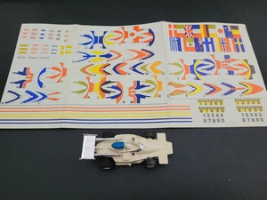 Faller AMS G-Plus Lola International Team Nr. 5663 mit Aufkleberbogen - Bild 1 von 6