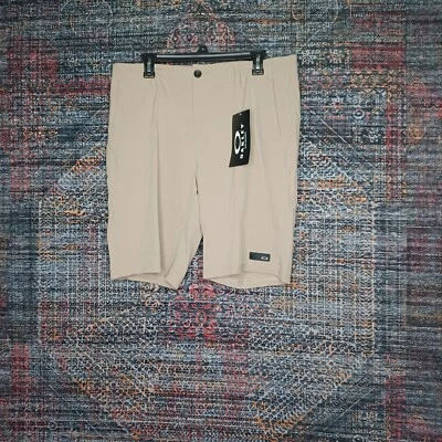 Pantalones cortos deportivos Oakley para hombre beige sólido base híbrida ajuste regular 36 nuevos con etiquetas Foto 1 de 4