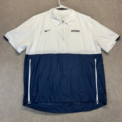 Camisa de calentamiento emitida por el equipo UConn Huskies para hombre L manga corta polo rompevientos Nike Foto 1 de 4