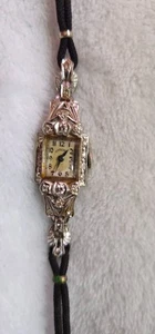 OROLOGIO DA DONNA VINTAGE HAMILTON ORO BIANCO 14K E 28 DIAMANTI CON CINTURINO IN CORDA FUNZIONANTE - Foto 1 di 16