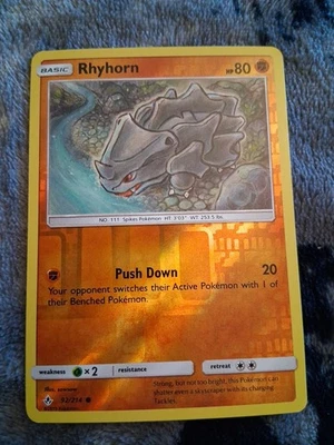 Rhyhorn 92/214 Sm-Unbroken Bonds Reverse Holo - Image 1 of 4