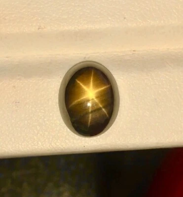 10.24ct AIG Certified 100% Natural Unheated Golden Black Star Sapphire - Image 1 of 2