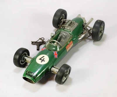 Auto da corsa giocattolo avvolgibile Schuco #1071 Lotus Ford Formula 1 - vintage anni 60 Germania - Immagine 1 di 4