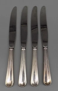 4 coltelli da tavola Reed & Barton modello Waverly piatto argento vintage Mirrorstele - Foto 1 di 4