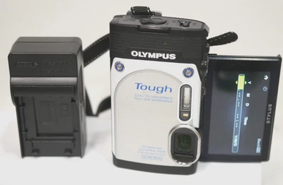 Cámara digital Olympus Stylus TG-850 IHS 16 mega píxeles (negra/plateada) - PROBADA Y FUNCIONANDO Foto 1 de 4
