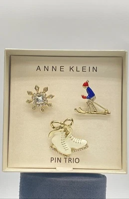 Prendedor Anne Klein tono dorado cristal invierno con caja 23,2 g Foto 1 de 4