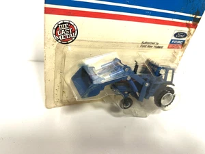 ERTL 1/64 FORD 8730 TRACTOR  WITH FRONT END LOADER - Picture 1 of 3