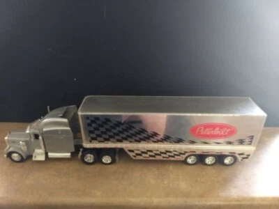1998 PETERBILT TRAILER TRUCK. Scale 1:32. Length 22 ". NEW RAY - No box.  - Image 1 of 4