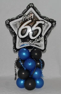 65° COMPLEANNO - ETÀ 65 - UOMO - DISPLAY PALLONCINO IN LAMINA - CENTROTAVOLA - Foto 1 di 7