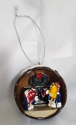 M&M'S WORLD - RED AND YELLOW HE DOES EXIST RESIN CHRISTMAS TREE ORNAMENT PUDDING - Image 1 of 4