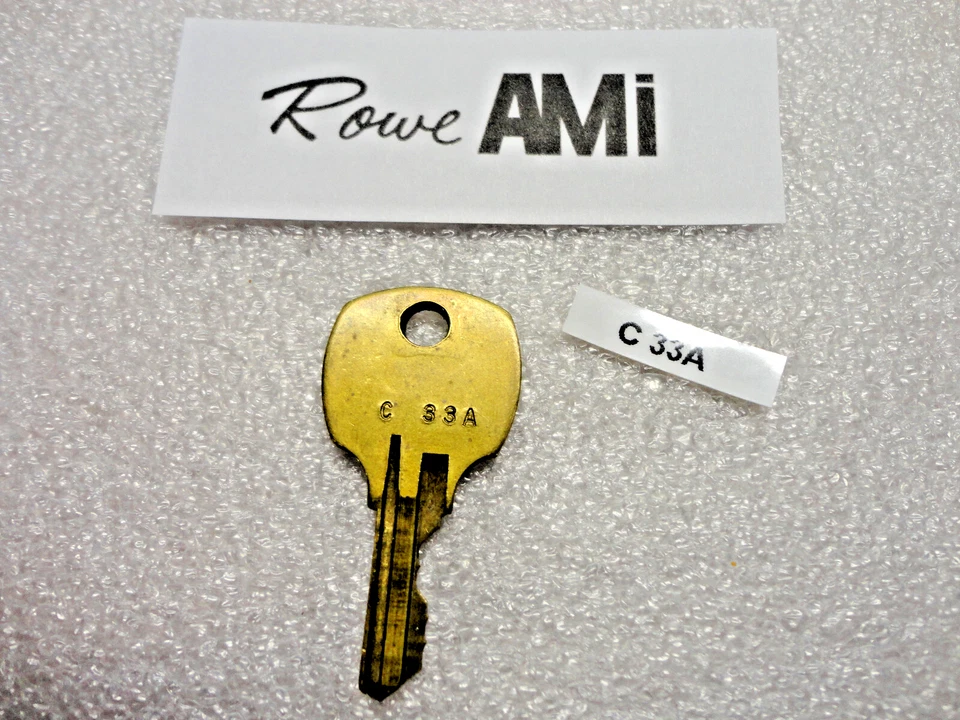 Llave de gabinete Rowe AMI C033A, genuina, usada stock antiguo, se adapta a 10 modelos Foto 1 de 1