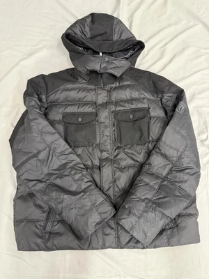 Chaqueta Calvin Klein Para Hombres 2XL Negra Con Capucha Puffer Acolchada Cremallera Completa Parche Logotipo CK Foto 1 de 4