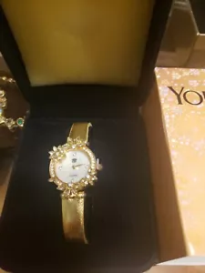 Reloj Elizabeth Taylor para mujer esfera de flores en tono dorado tono dorado nuevo - Imagen 1 de 3