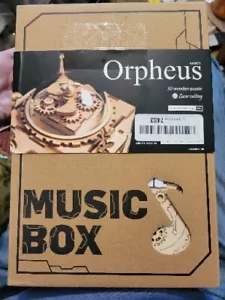 Nuovo con scatola Rokr AM601 carillon steampunk robot in legno Orpheus puzzle - Foto 1 di 5