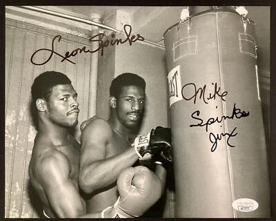 Leon Spinks Signed Photo 8x10 vs Michael Spinks Autograph Boxing Gloves HOF JSA - Image 1 of 3
