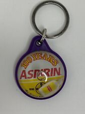Porte-clés promotionnel vintage 1999 Bayer Aspirine 100e anniversaire de collection